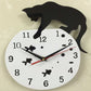 Cat On Wall Clock Catching Fish